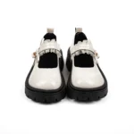 lace-strap-patent-leather-platform-mary-janes-cream-front-view